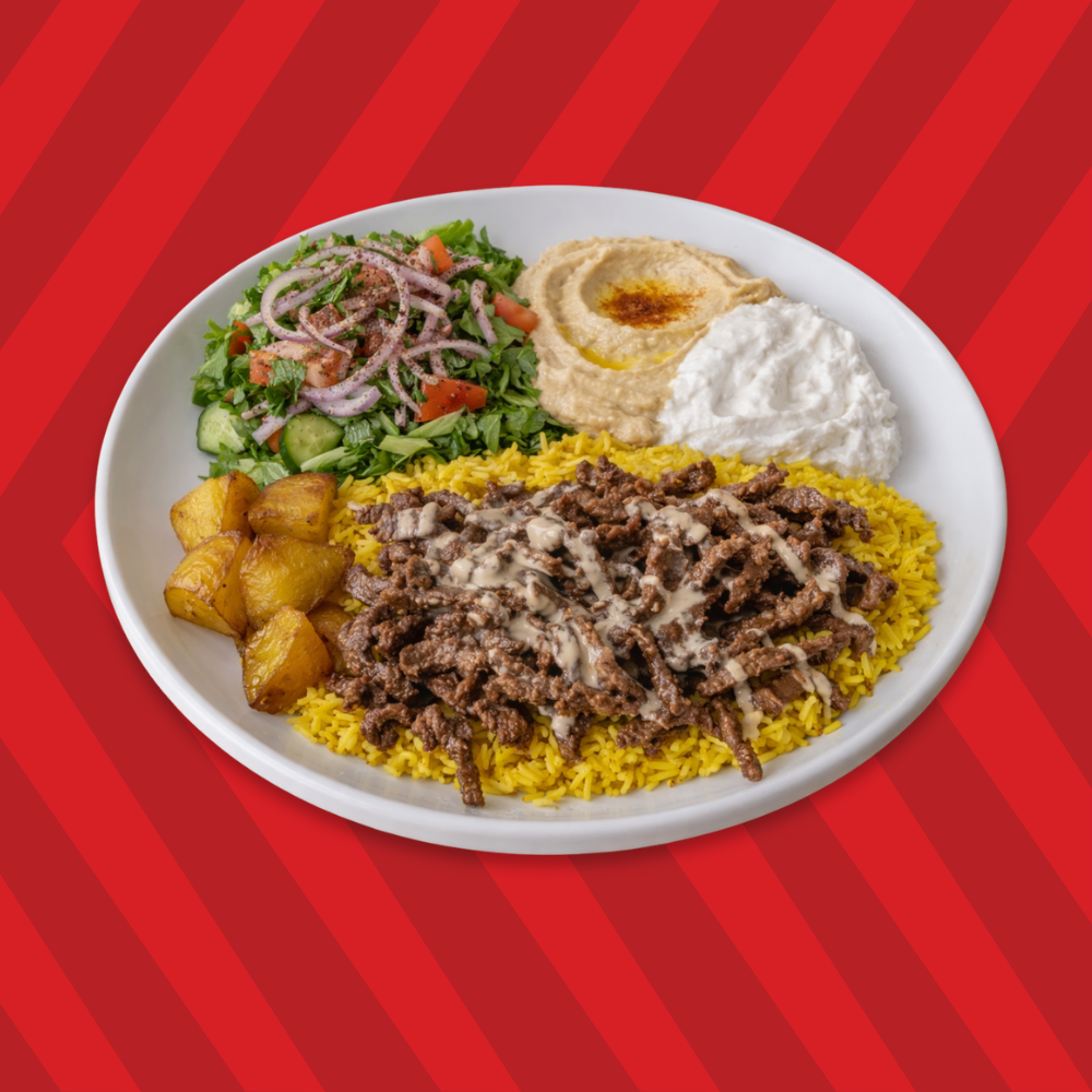 Beef shawarma plate with rice, salad, hummus and garlic sauce